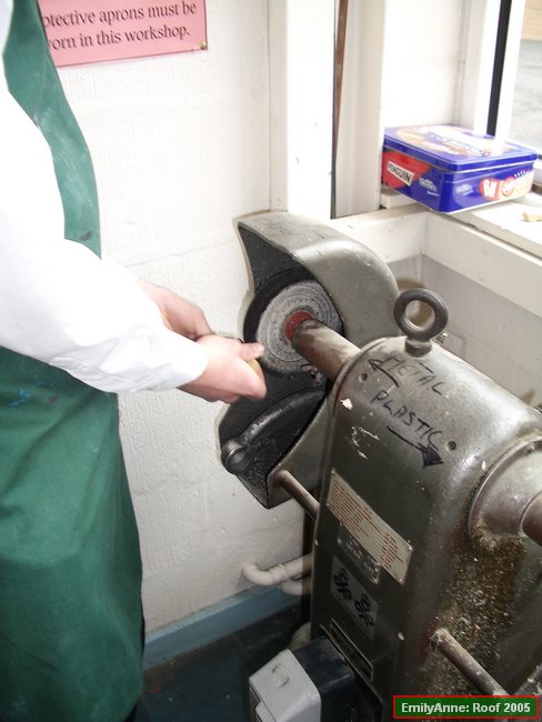 y-60 buffing the brass pliers.JPG