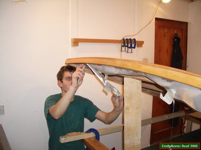 y21-Once the epoxy was part-cured, the excess cloth was trimmed.JPG