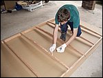 55-Spreading the glue on the frame.JPG