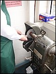 y-60 buffing the brass pliers.JPG