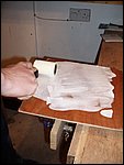 z16-rollering the white epoxy over the grp.JPG